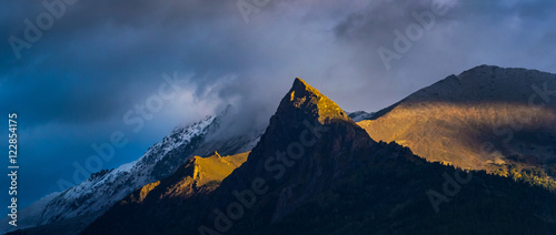 Beautiful rock Zakan in the first sunbeam. Caucasus mountains.