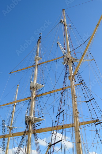 Rigging of a large sailing vessel against blue sky