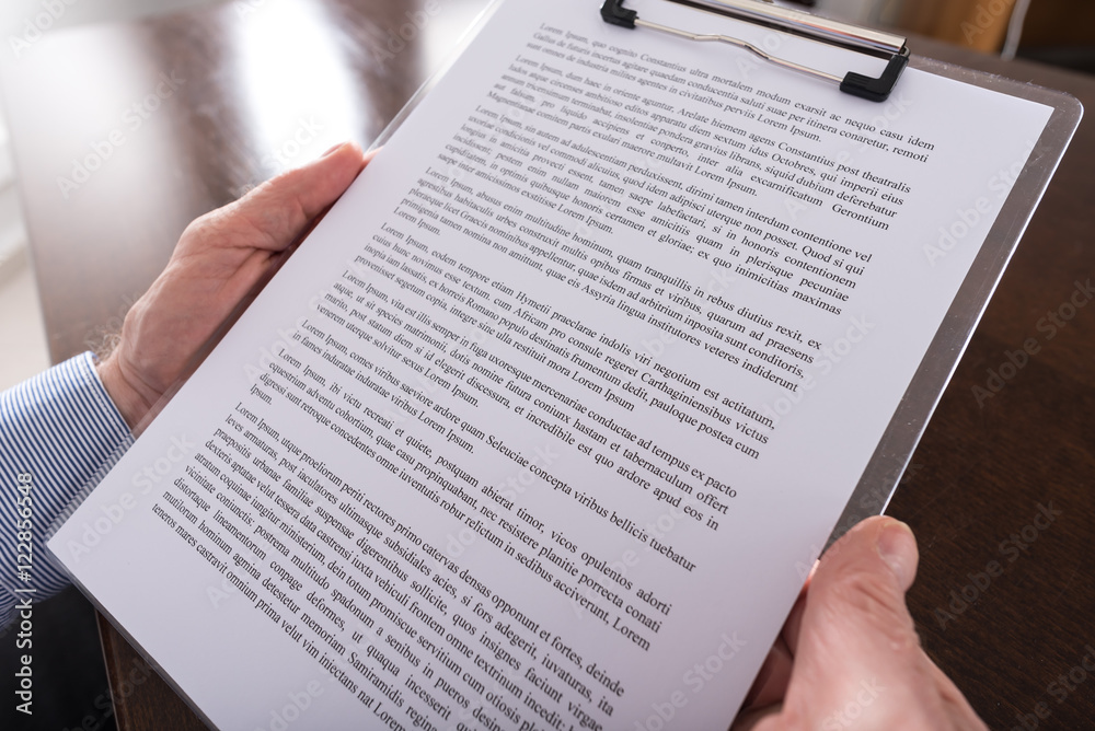 Obraz premium Reading a document