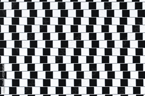 Lines are parallel but seem to be slanted - optical illusion. photo