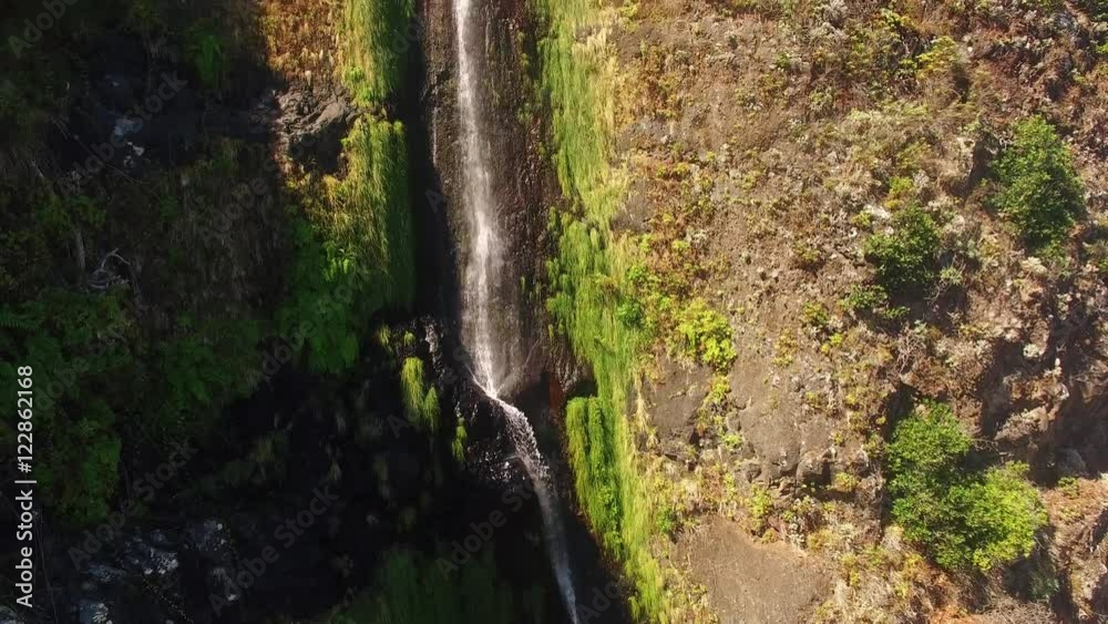 aerial view of waterfall and ocean in Madeira island aerial view of waterfall and ocean in Madeira island