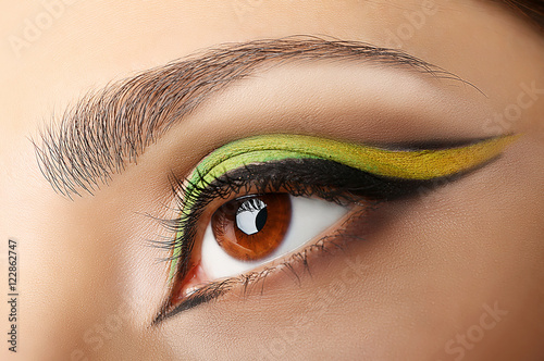 Colourful eye makeup, closeup