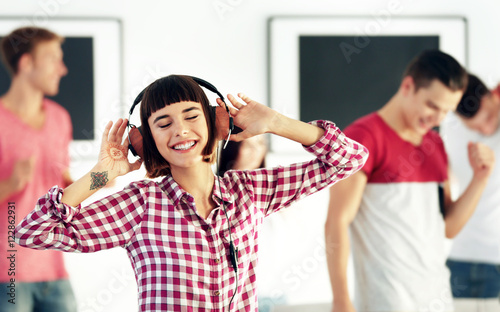 Beautiful girl listening to...
