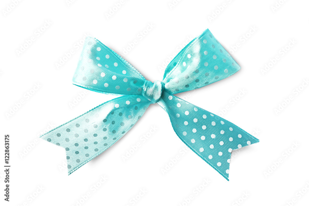 Beautiful green bow with polka dot pattern on white background Beautiful green bow with polka dot pattern on white background