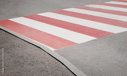 Pedestrian crossing with red and white marking