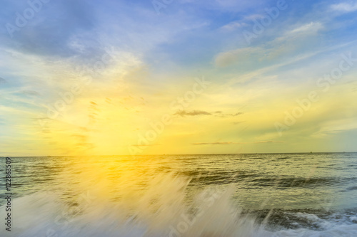 abstract scene of sea with water splash and sunset time