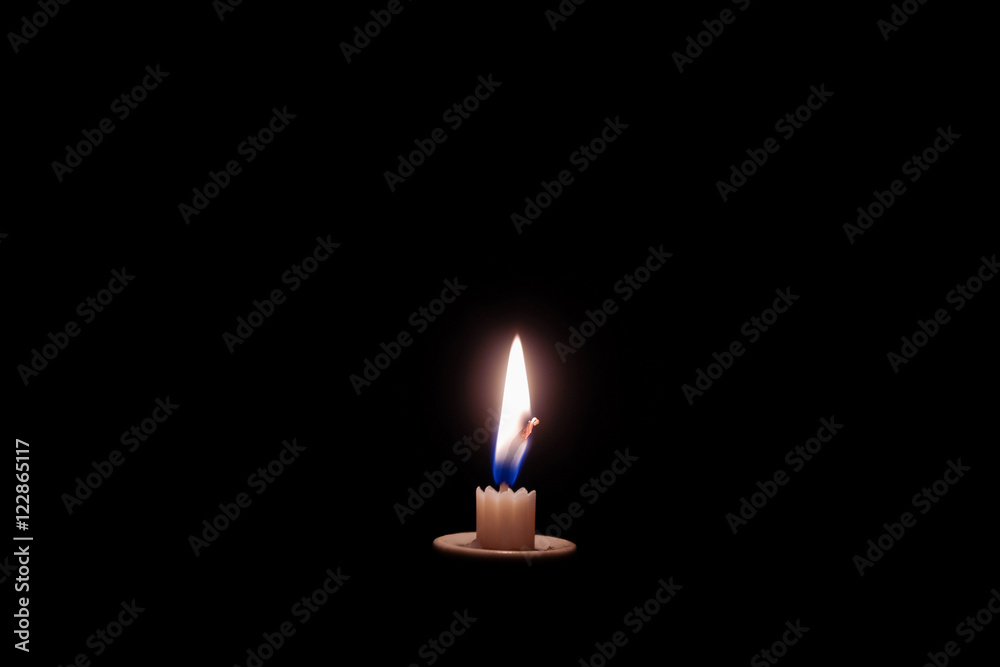 Fototapeta premium Candle in the darkness