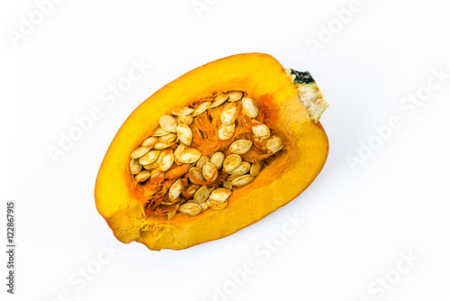 Slice of pumpkin isolated on white background, top view