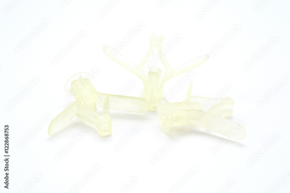 Obraz premium Plastic fastener on a white background