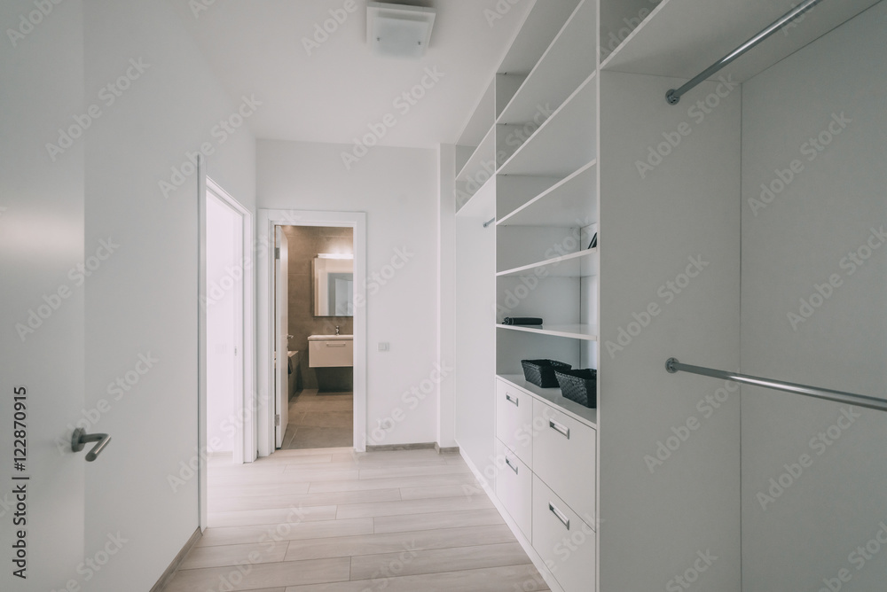 Light interior with flooring in a modern apartment Light interior with flooring in a modern apartment