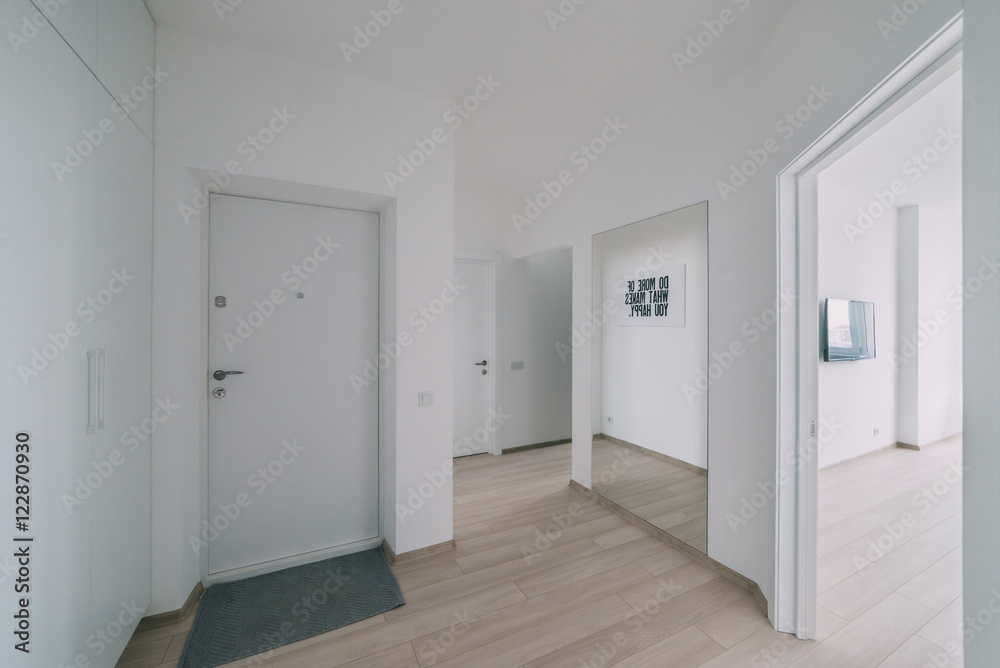 Light interior with flooring in a modern apartment Light interior with flooring in a modern apartment