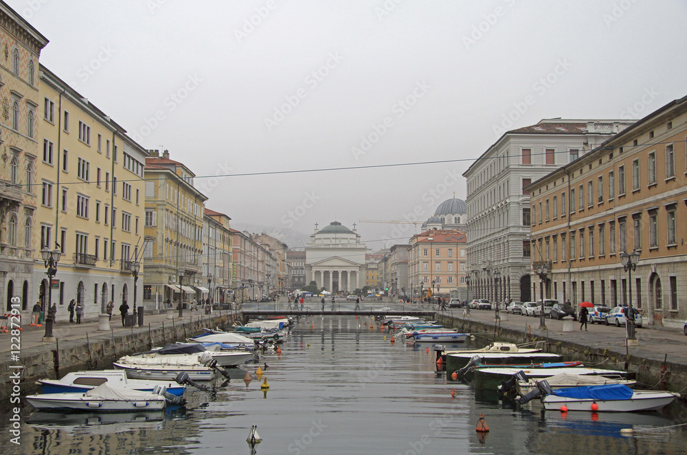 Canal grande with boats in Trieste city center