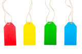 Colored price tags with rope on white, isolated  background. Top view. Flat lay.