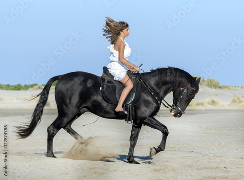 horse woman on the beach