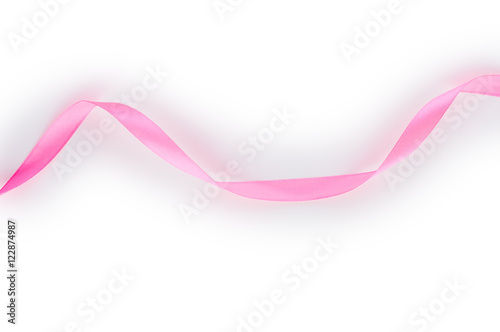 Pink satin ribbon isolated on white background. Top view. Flat lay.