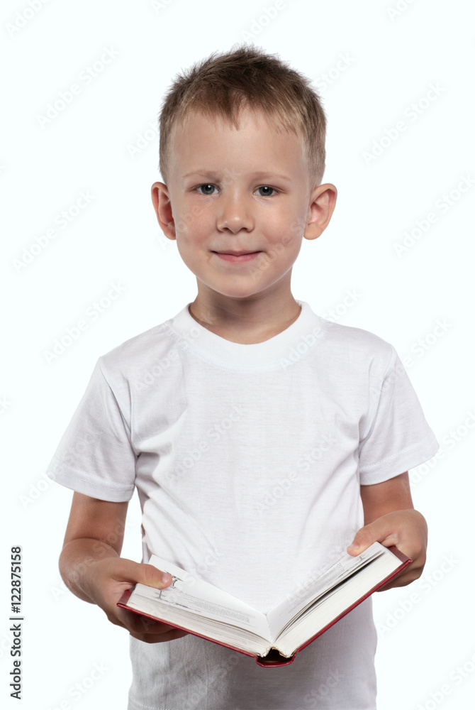 Boy with an open book, isolated on a white. Boy with an open book, isolated on a white.