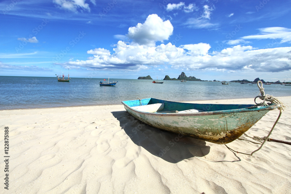 boat on sand blue sky and sea for background boat on sand blue sky and sea for background
