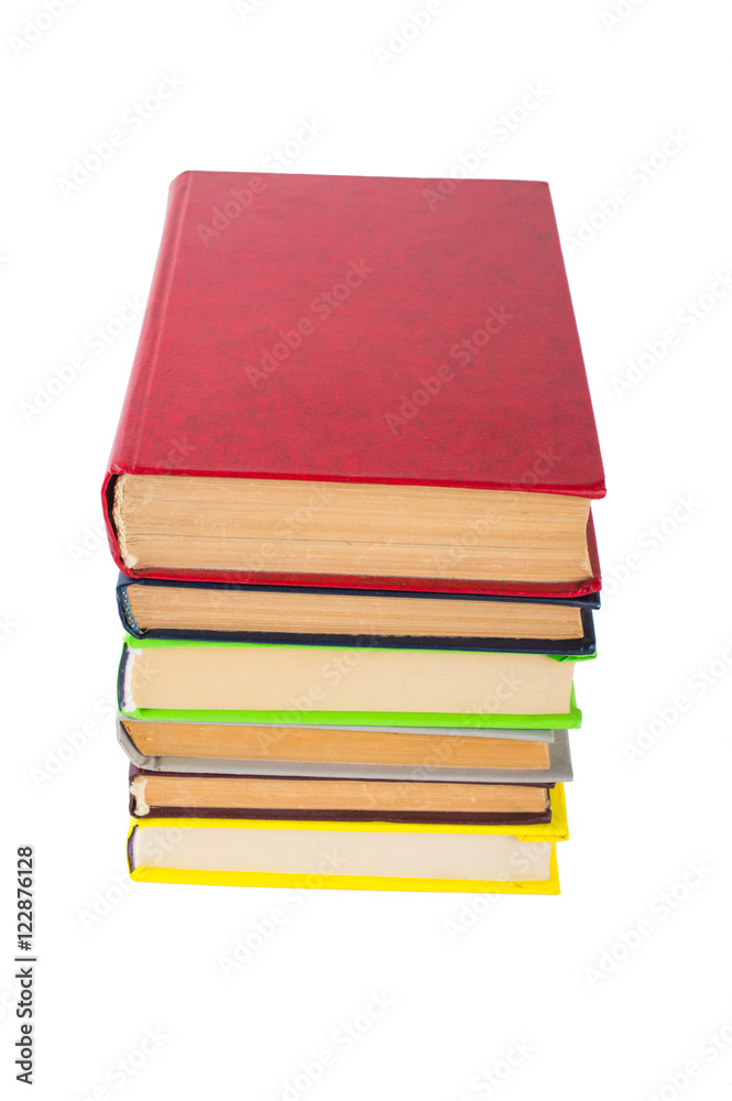 stack of multicolored books. on white, isolated background. stack of multicolored books. on white, isolated background.
