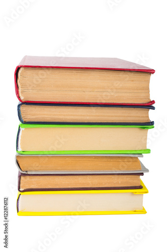 stack of multicolored books. on white, isolated background.
