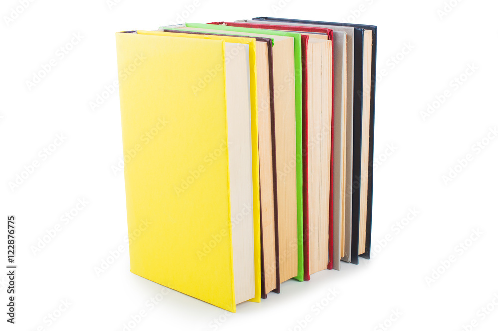 stack of multicolored books. on white, isolated background.