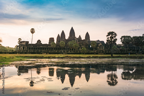 Sunrise in Angkor Wat, a temple complex in Cambodia and the largest religious monument in the world. UNESCO World Heritage Site. © supakit