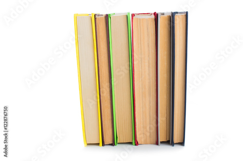 stack of multicolored books. on white, isolated background.