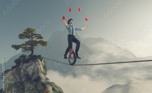 Young man as juggler