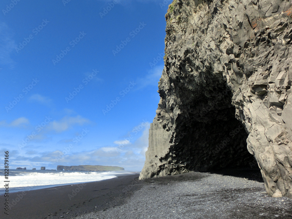 Cave made from hexagonal basalt rock columns on Icelandic shore