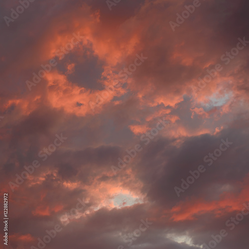 bright red sky with clouds at sunset