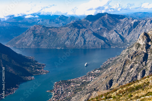 View from the mountain on a large cruise ship in the Bay of Kotor