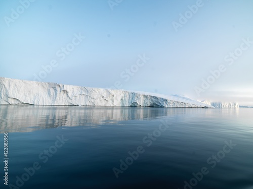 huge icebergs are on the arctic ocean in Greenland