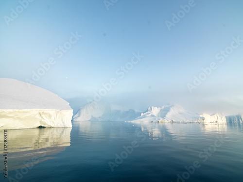 huge icebergs are on the arctic ocean in Greenland