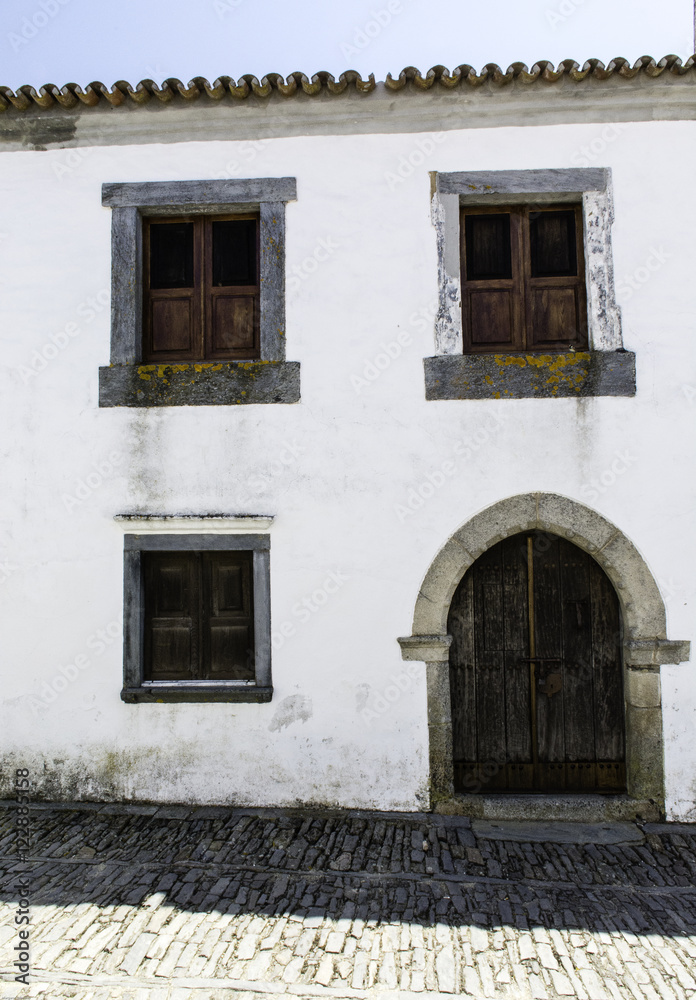 Whitewashed home entrance