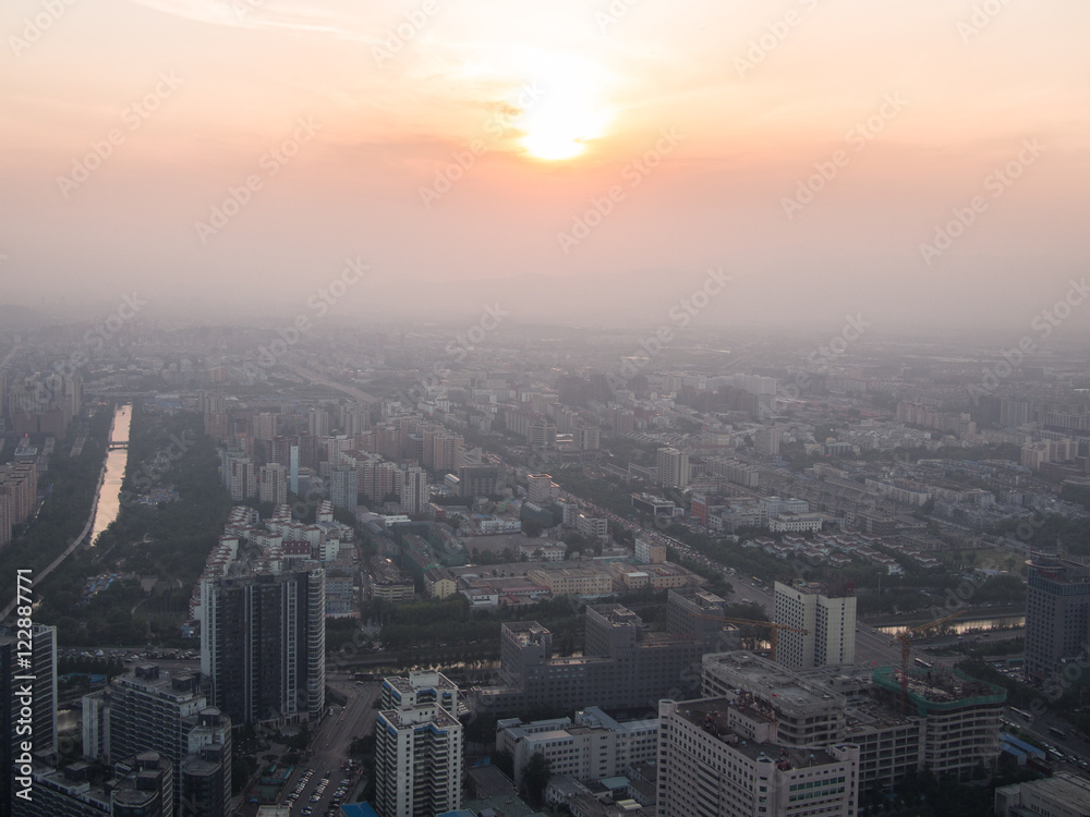 Evening view from the Central Radio TV Tower at the downtown area Beijing on sunset background