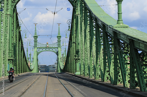Photography Liberty Bridge entrance with one motorcycle, Budapest