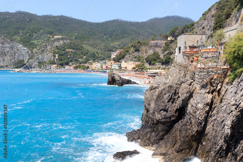 Rocky coast at Cinque Terre village Monterosso al Mare and Mediterranean Sea, Italy