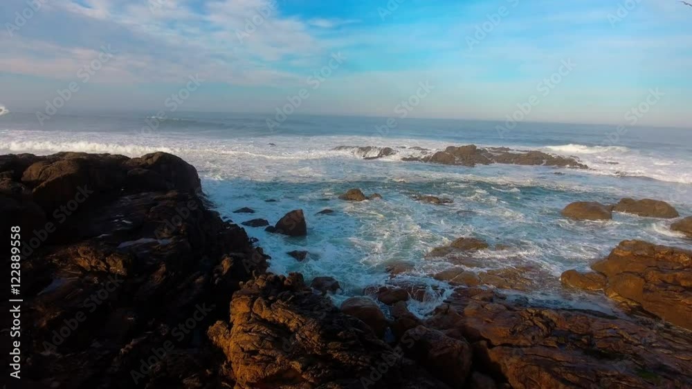 AERIAL: Flying over the cliffs at seaside AERIAL: Flying over the cliffs at seaside