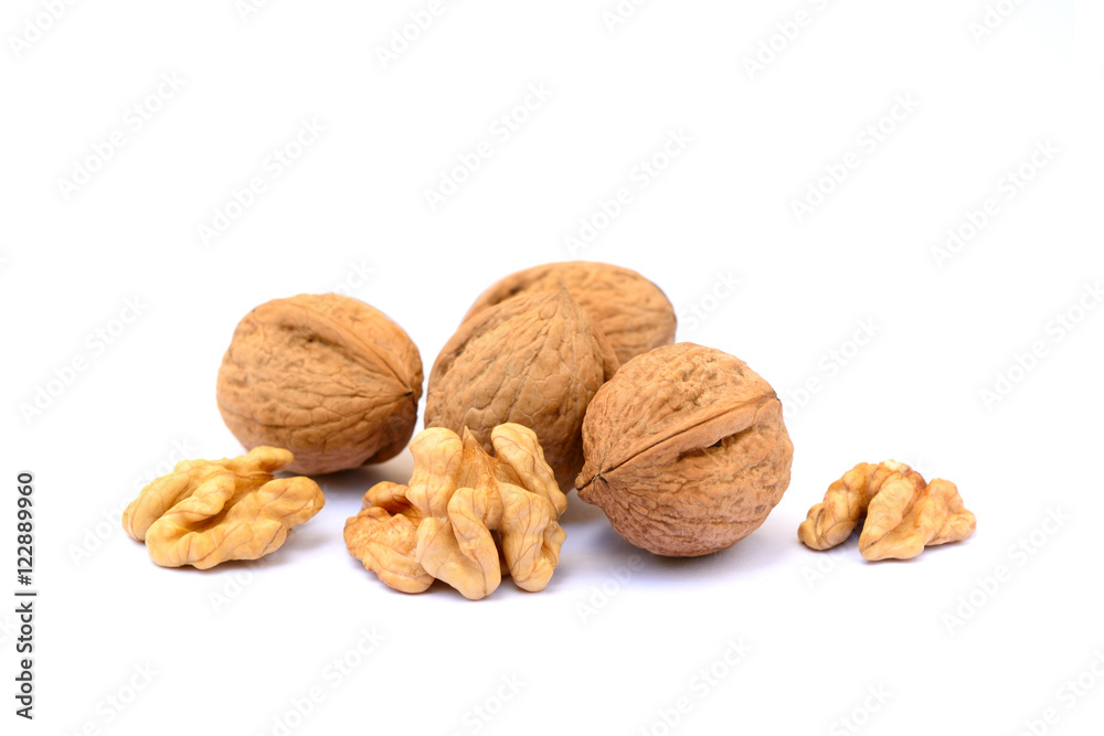 Pile of walnuts in shell isolated with white background Pile of walnuts in shell isolated with white background