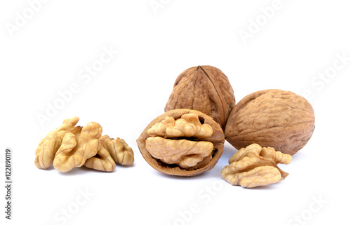 Pile of walnuts in shell isolated with white background