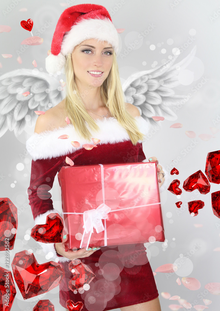 Belle fille angélique en tenue de mère Noël Stock Photo | Adobe Stock