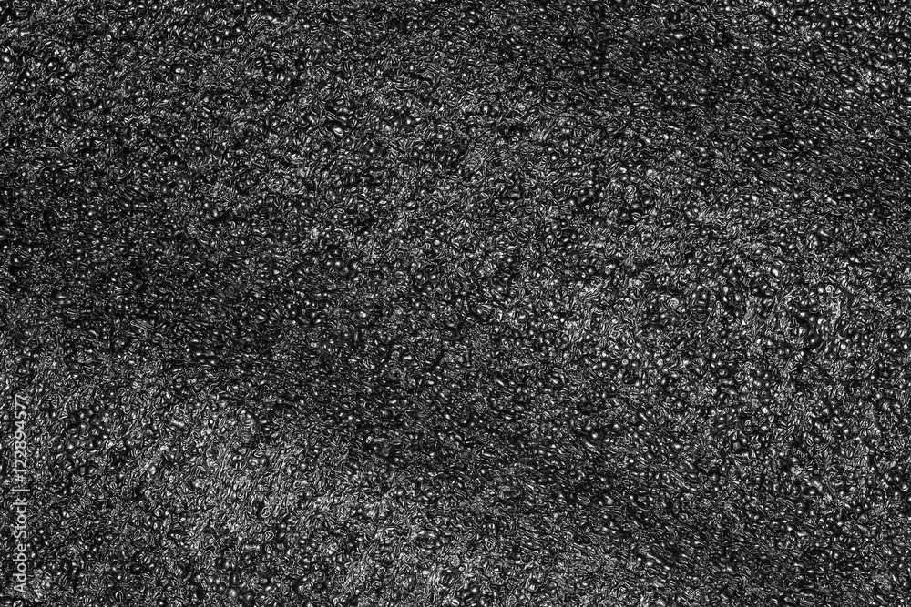 Fototapeta premium Black plastic foam texture. Foam rubber texture for background.