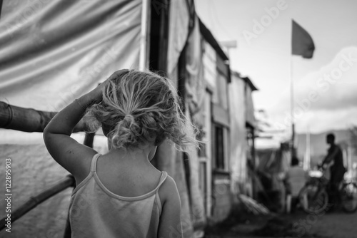 Little girl in occupation camp photo