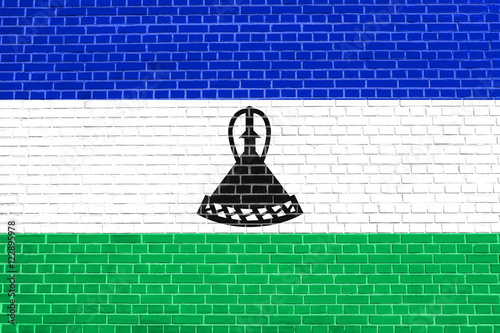 Flag of Lesotho on brick wall texture background