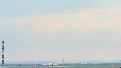 Airplane braking after landing photo