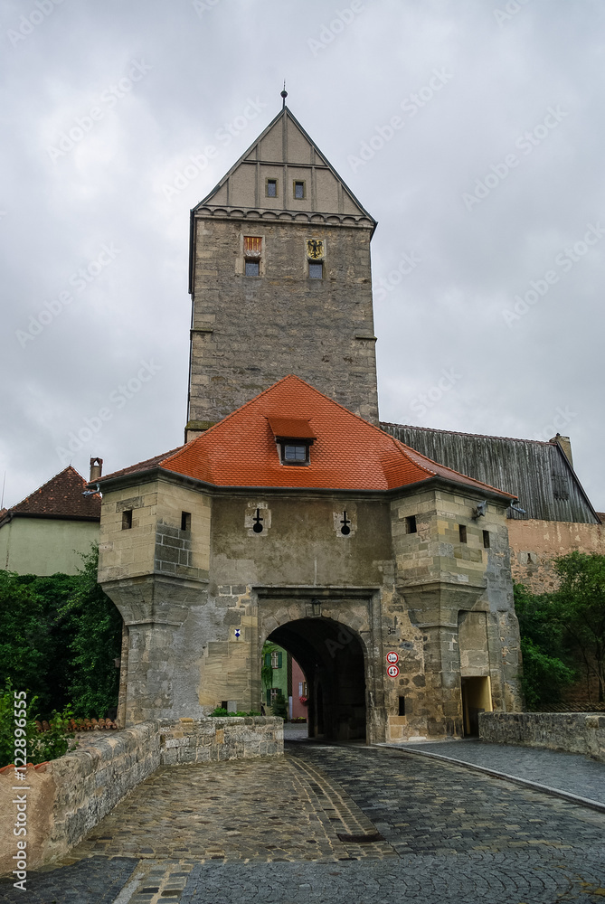 Gate tower in Dinkelsbuhl, Germany. It is one of the best-preserved medieval towns in Europe, part of the famous Romantic Road tourist route.