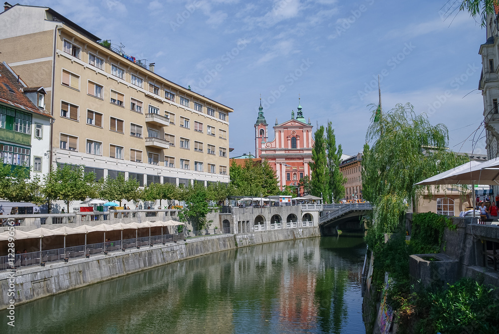 Old town embankment in Ljubljana with the franciscan church of annunciation. Slovenia