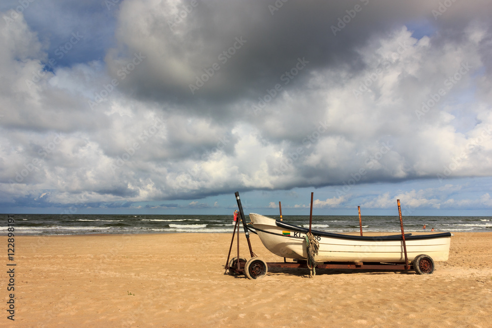 Fototapeta premium Boat on the beach of baltic sea.