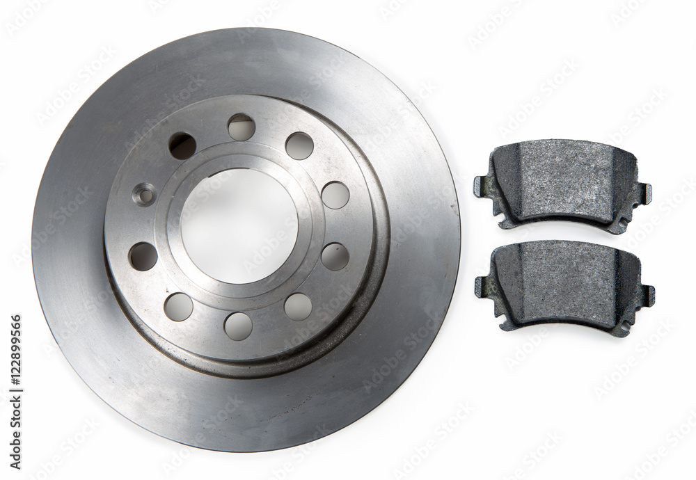 car brake disc and pads on white background car brake disc and pads on white background