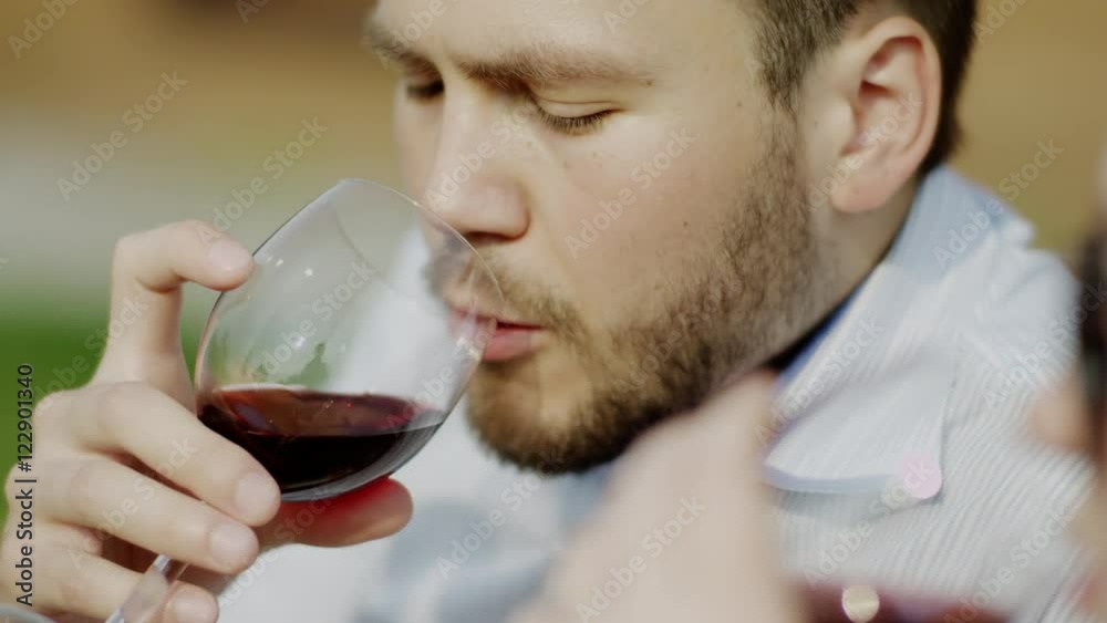 man drinls wine with his girlfriend man drinls wine with his girlfriend