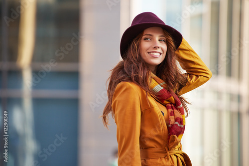 young brunette woman portrait in autumn color